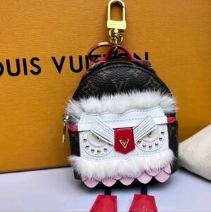 Louis Vuitton Bijou Sac Wild Mini Owl Puppet Monogram Bag Charm.